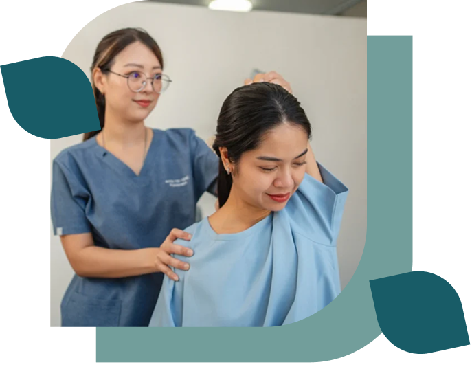 Woman receiving a shoulder massage in clinic.